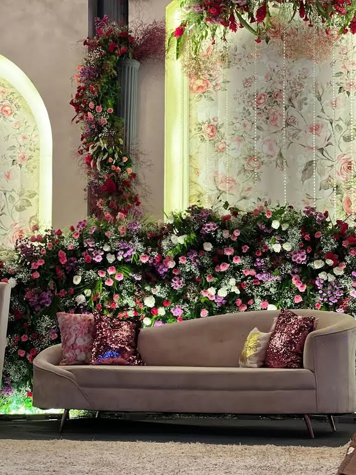 Floral arch and lounge wedding setup